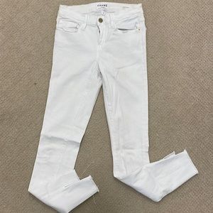 Frame white skinny jean. Size 26. Small spots on back pocket (see picture)